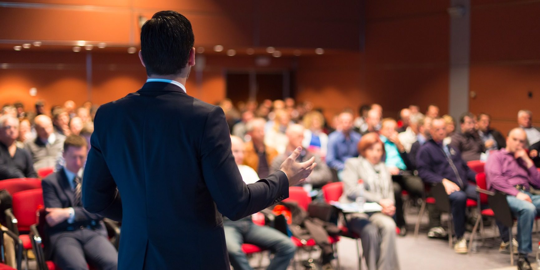 Speaker at Business Conference and Presentation.